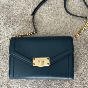 Blue Michael Kors Crossbody. Brand new used once or twice. Wallet purse